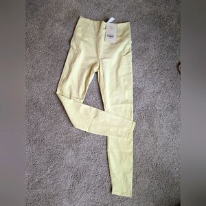 Fabletics PureLux pale yellow athletic leggings